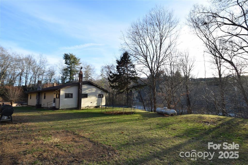 433 Deneen Road Burnsville, NC 28714 - Photo 1 of 32 a view of a house with a yard