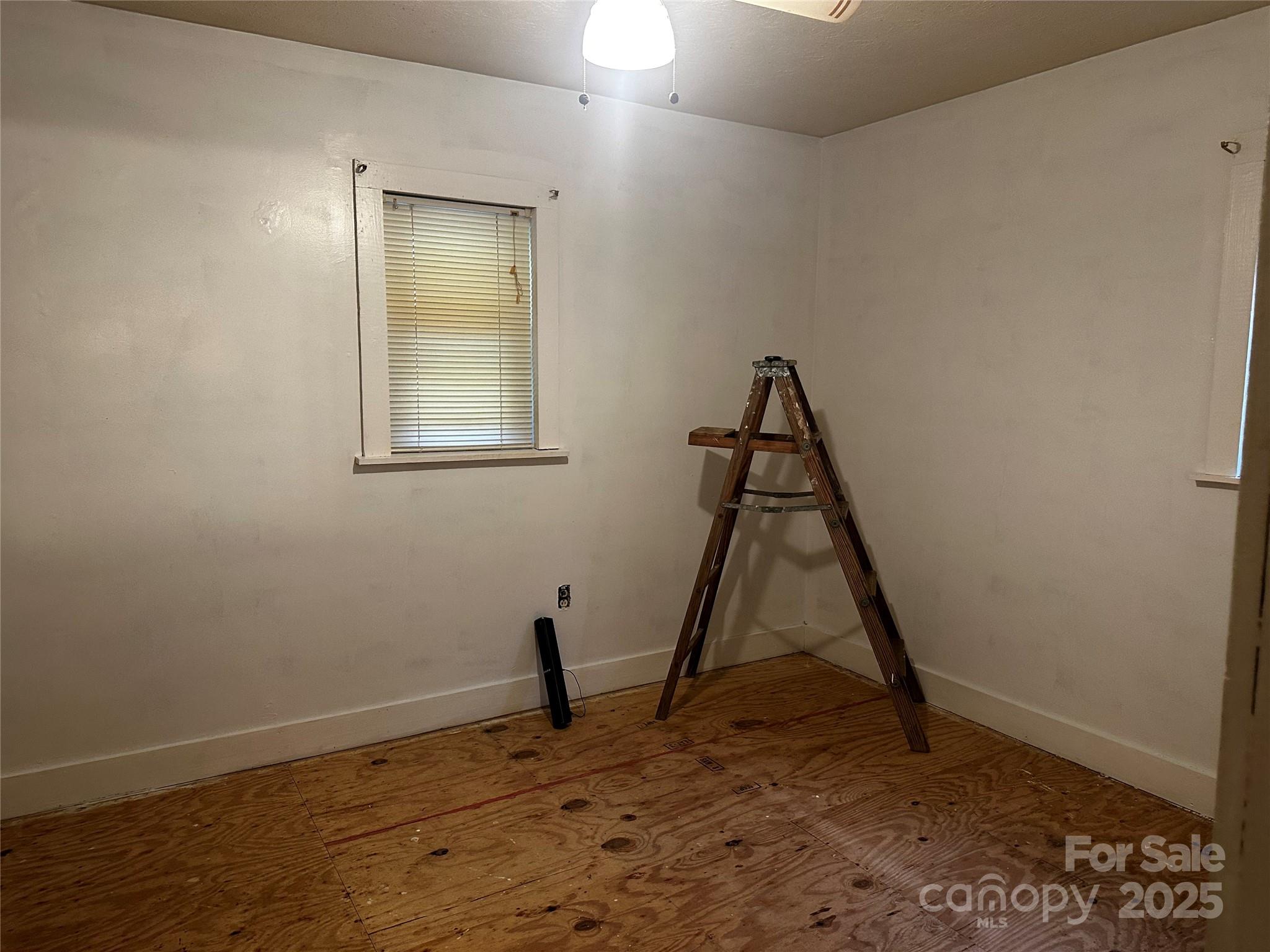433 Deneen Road Burnsville, NC 28714 - Photo 13 of 32 a view of a room with a slide