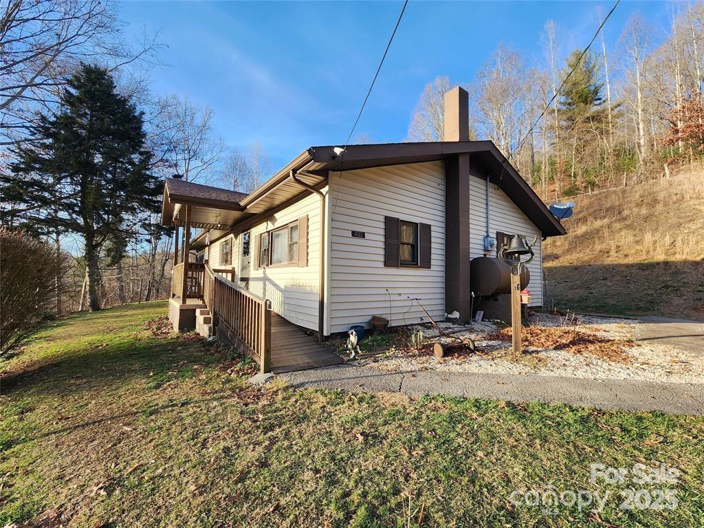 433 Deneen Road Burnsville, NC 28714 - Photo 32 of 32 a view of a house with a yard