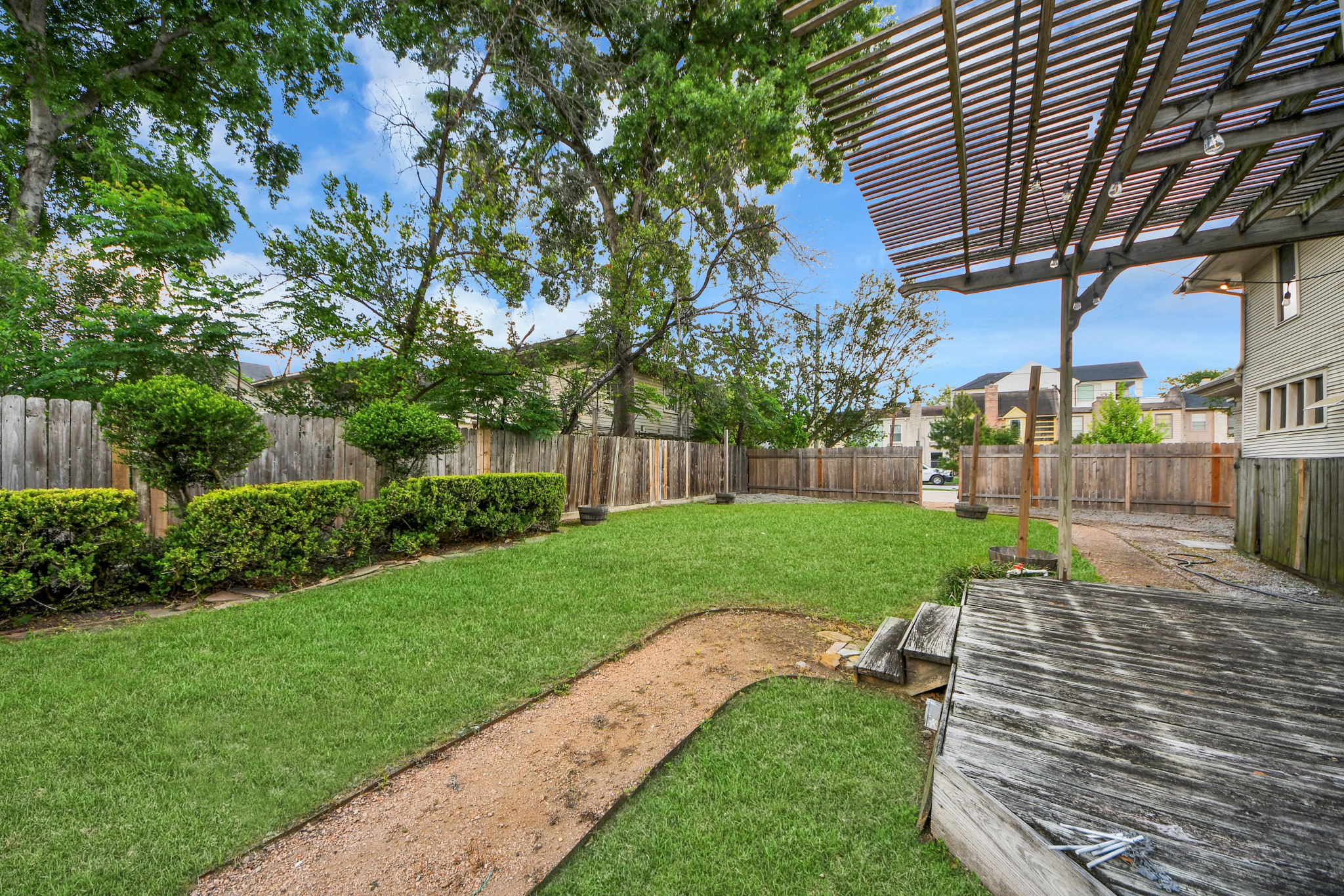 2014 Commonwealth Street Houston, TX 77006 - Photo 39 of 49 a view of a house with a yard