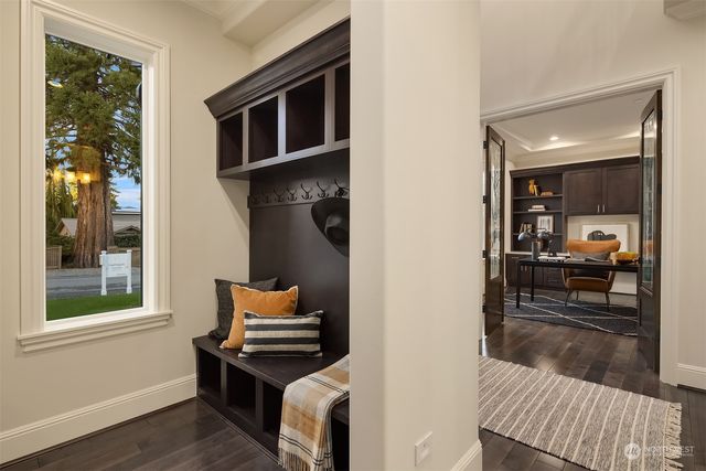 a kitchen with stainless steel appliances granite countertop a stove and a refrigerator