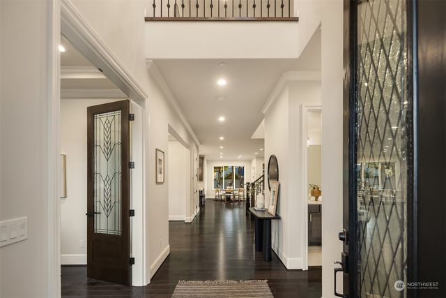 a view of gallery with wooden floor