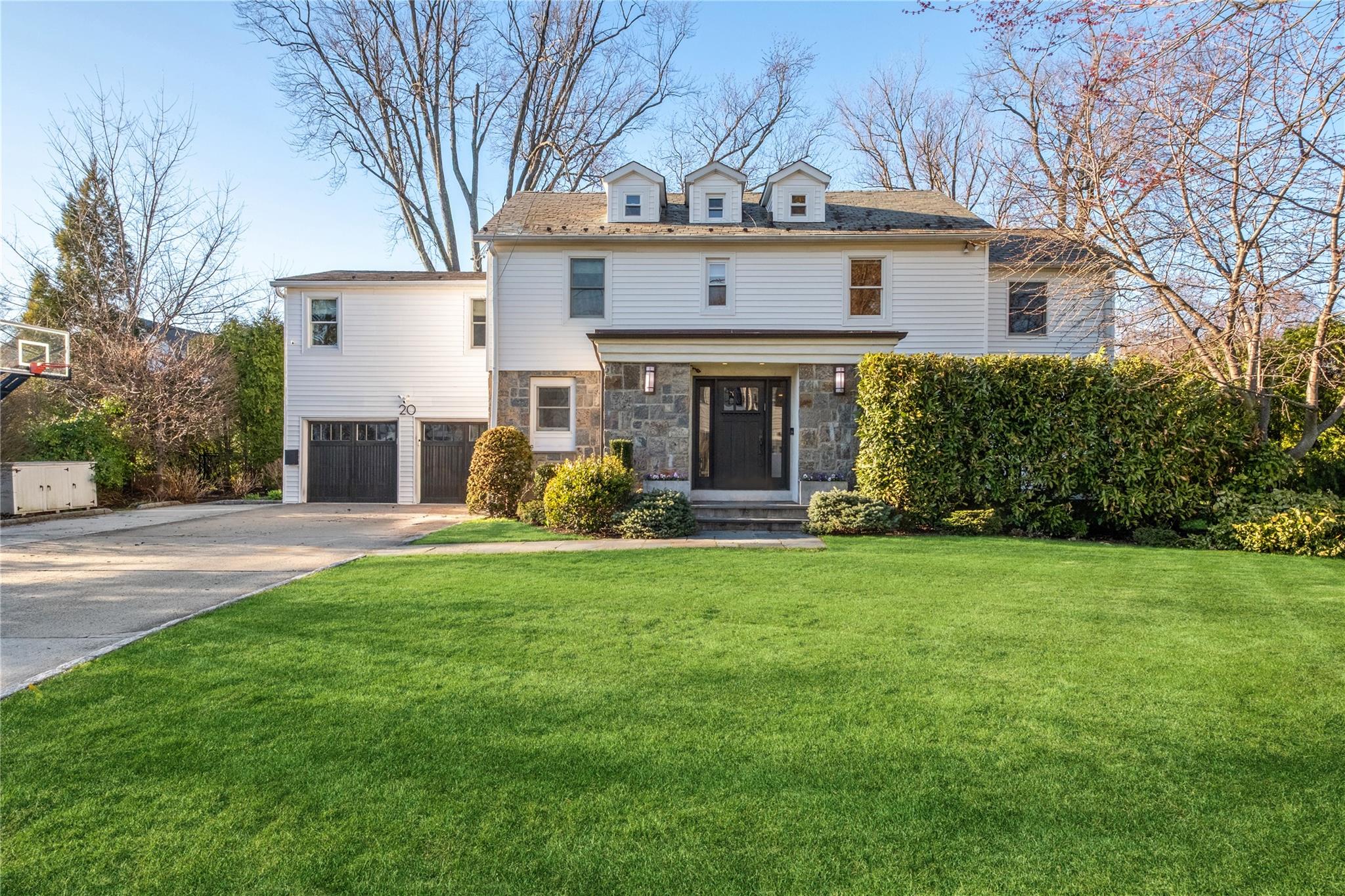 20 Stratton Road Scarsdale, NY 10583 - Photo 1 of 1 front view of a house with a yard