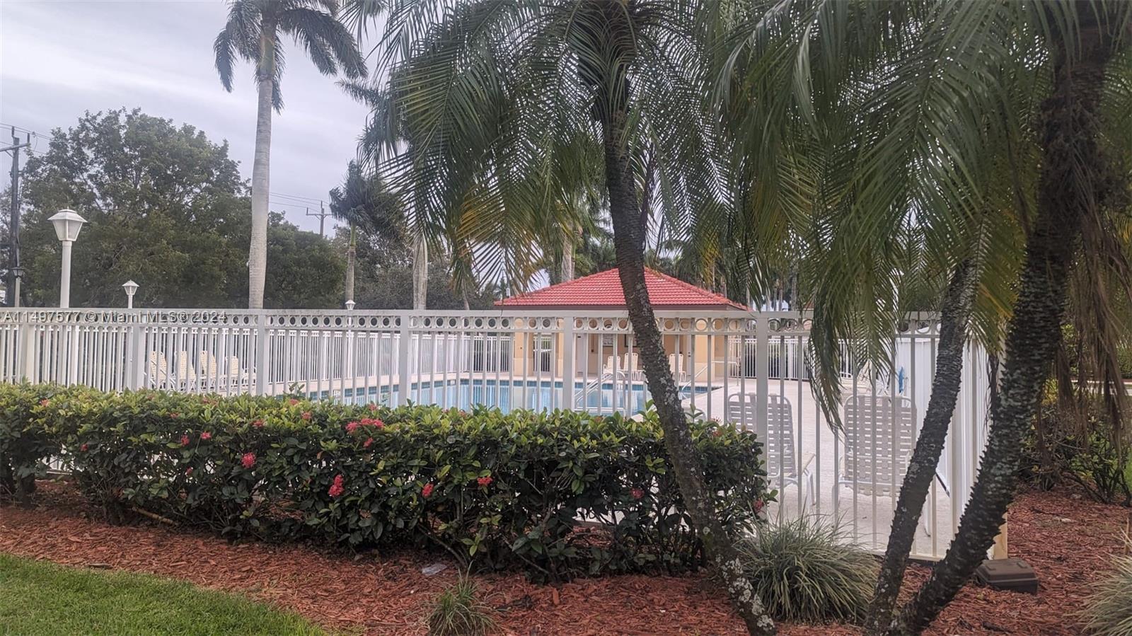 Shenandoah Davie, FL 33325 - Photo 16 of 61 a view of a garden with a fountain
