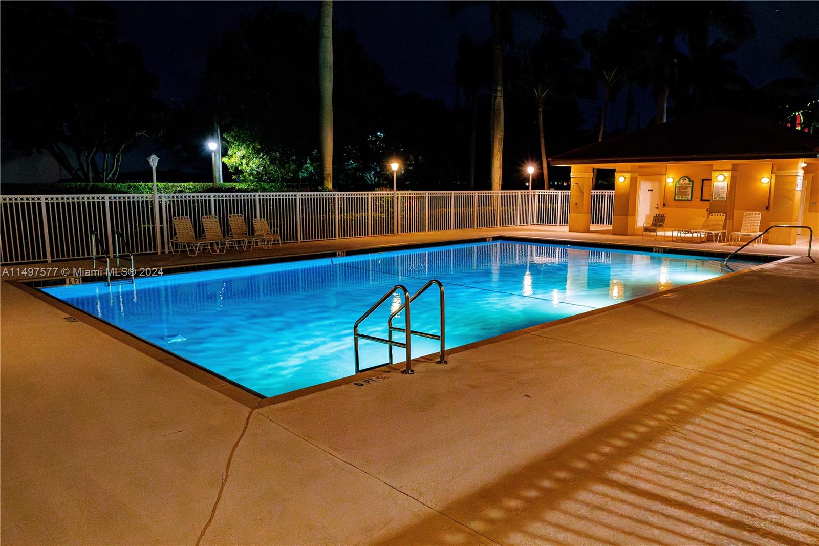 Shenandoah Davie, FL 33325 - Photo 18 of 61 a view of swimming pool with chairs