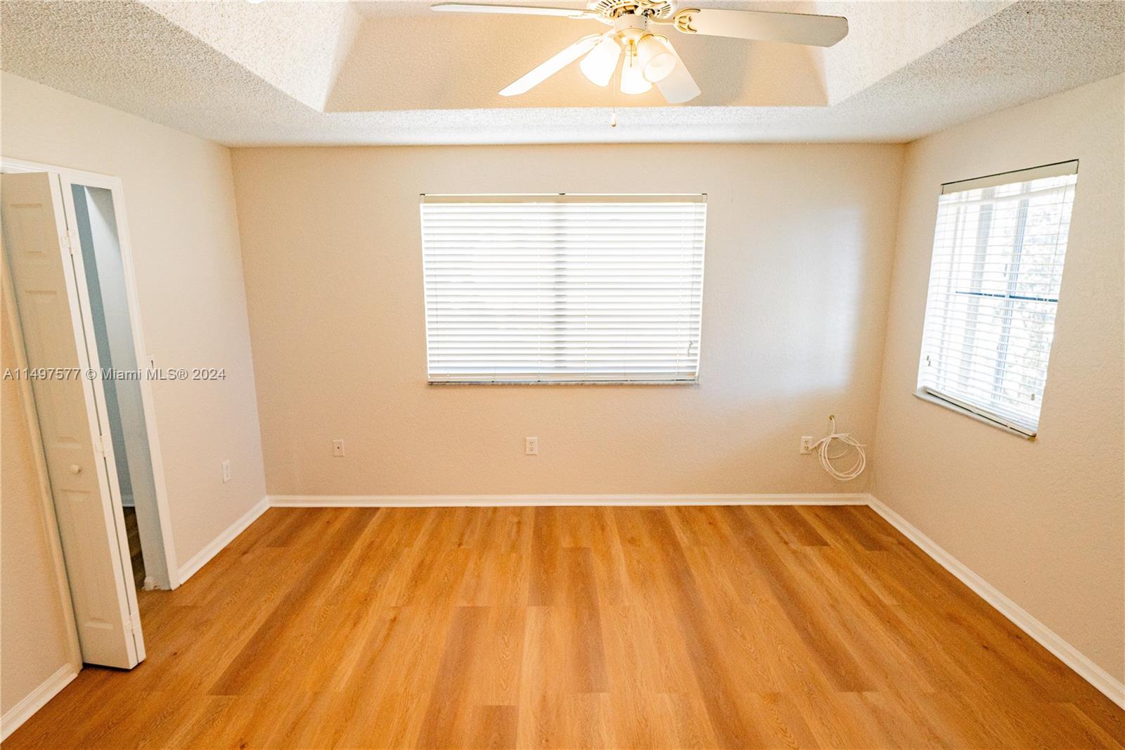 Shenandoah Davie, FL 33325 - Photo 28 of 61 a view of a room with wooden floor and a window