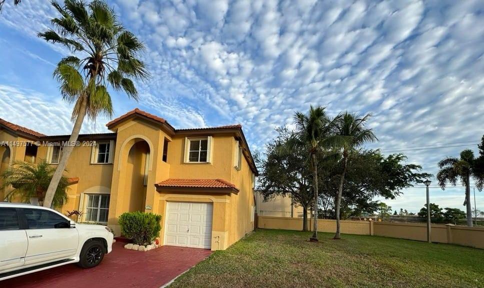 Shenandoah Davie, FL 33325 - Photo 3 of 61 a front view of a house with a yard