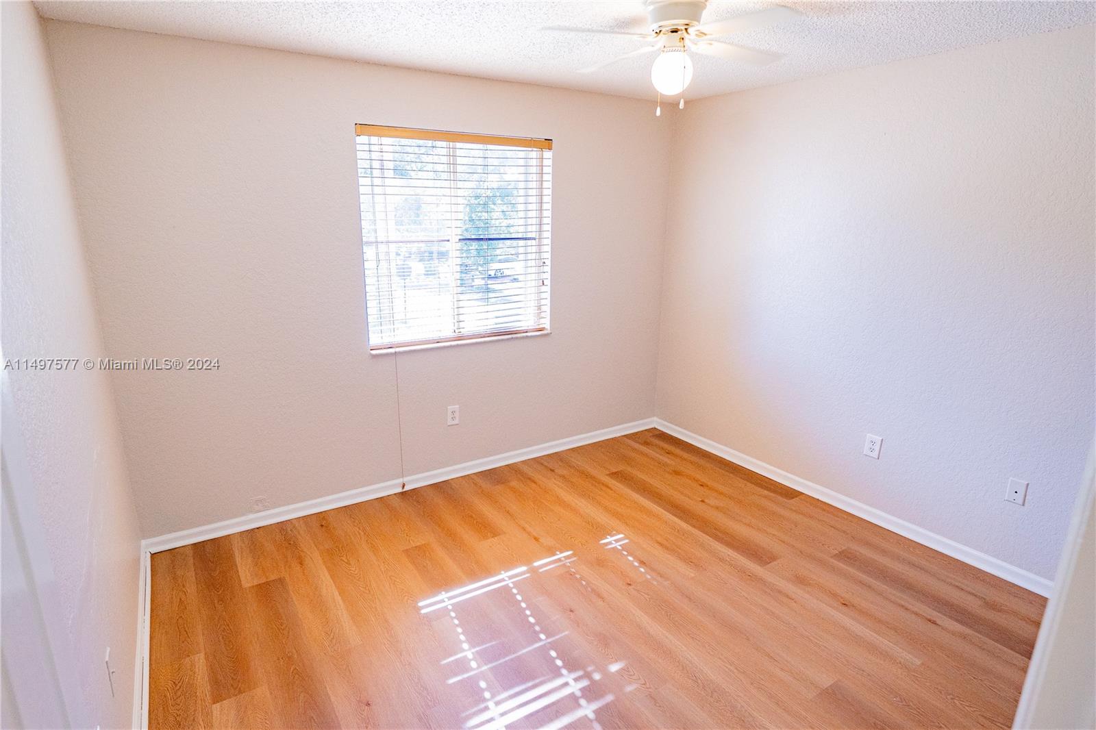 Shenandoah Davie, FL 33325 - Photo 31 of 61 an empty room with a window