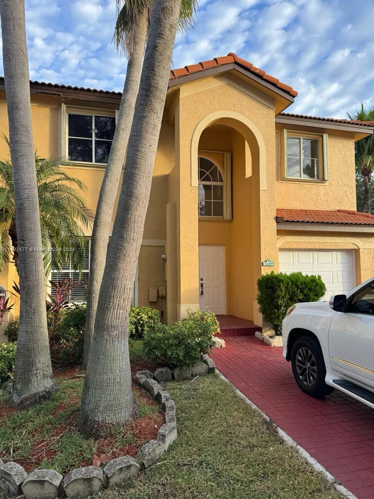 Shenandoah Davie, FL 33325 - Photo 4 of 61 a view of a house with a garden