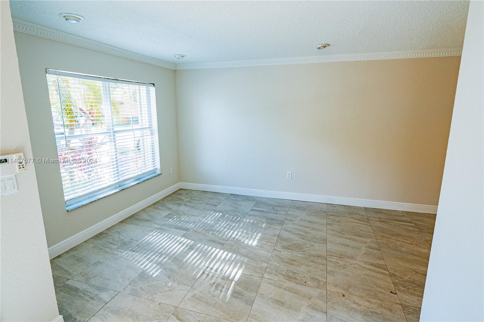 Shenandoah Davie, FL 33325 - Photo 44 of 61 a view of an empty room with a window