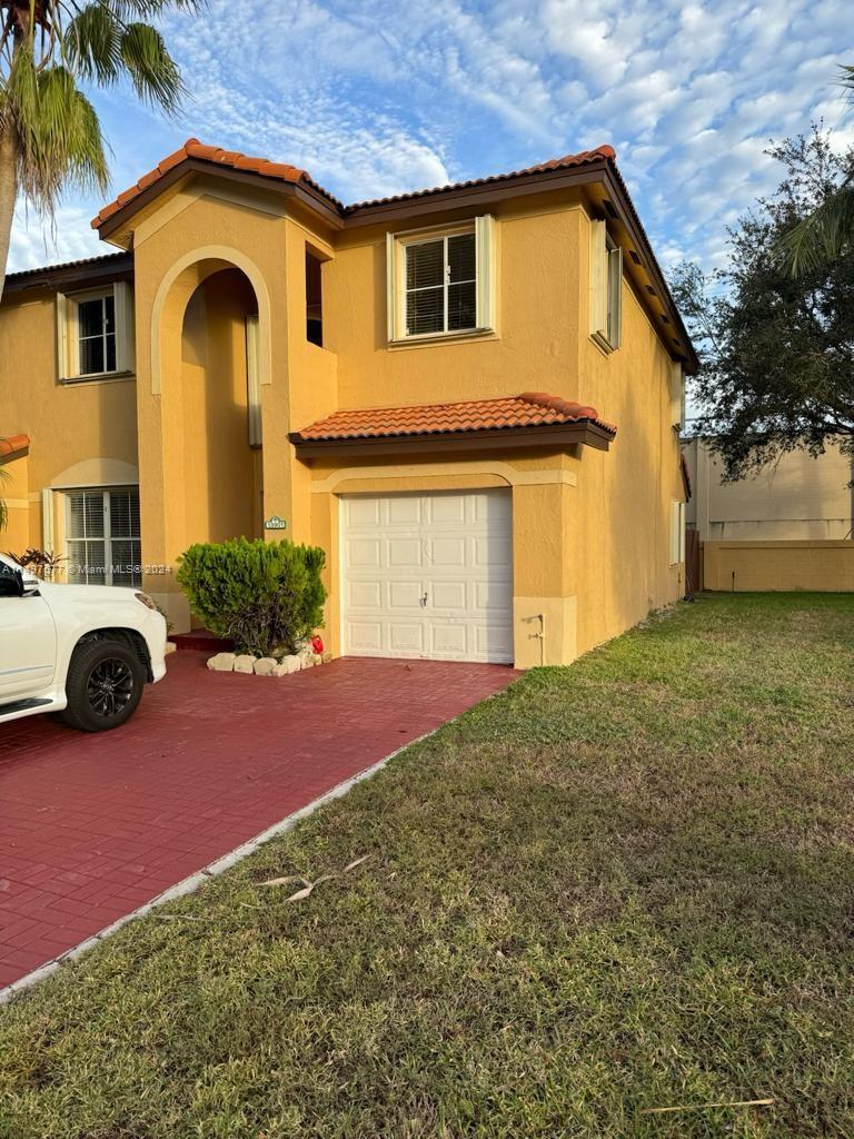 Shenandoah Davie, FL 33325 - Photo 5 of 61 a front view of a house with garden