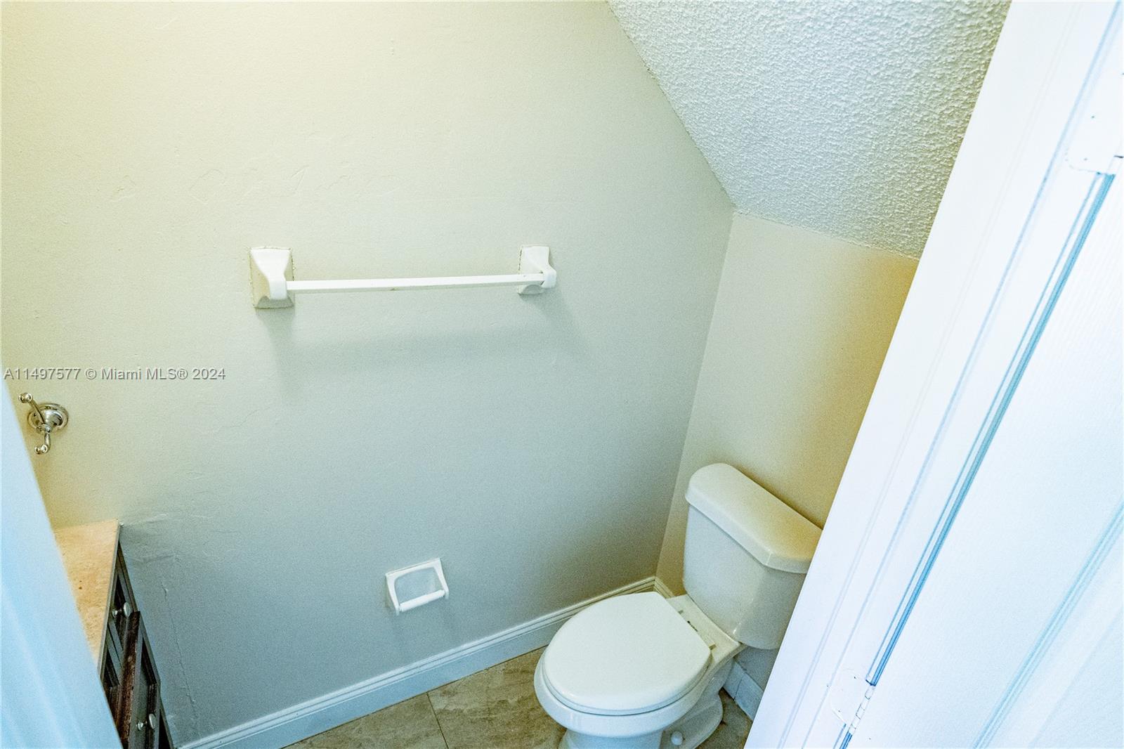 Shenandoah Davie, FL 33325 - Photo 55 of 61 a white toilet sitting next to a shower