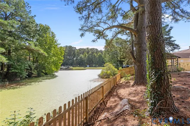 a view of a balcony with trees
