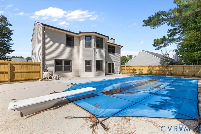 a house view with a backyard space