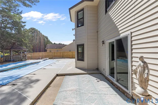 a view of a backyard of the house