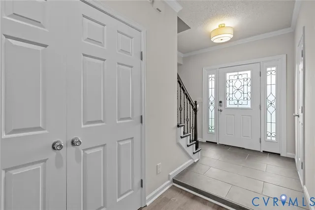 a view of a livingroom with stairs