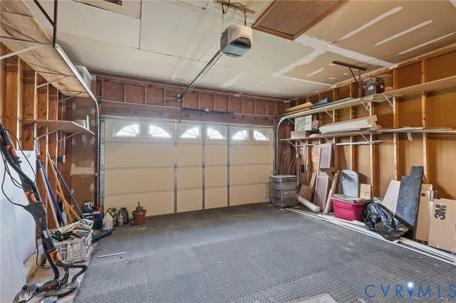 a view of an empty room with wooden walls