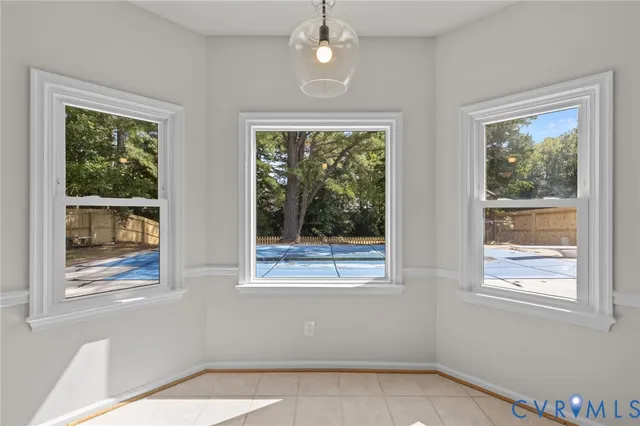 a view of empty room with large window