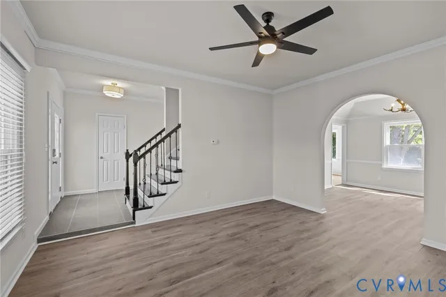 a view of an entryway with wooden floor