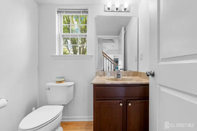 a kitchen with stainless steel appliances kitchen island sink refrigerator and microwave