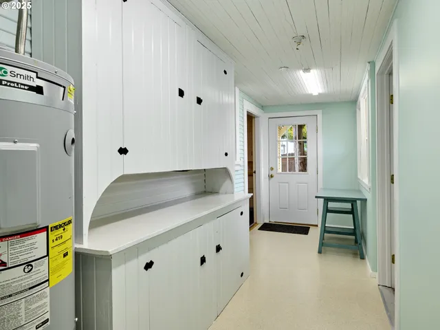 a bathroom with a sink and mirror