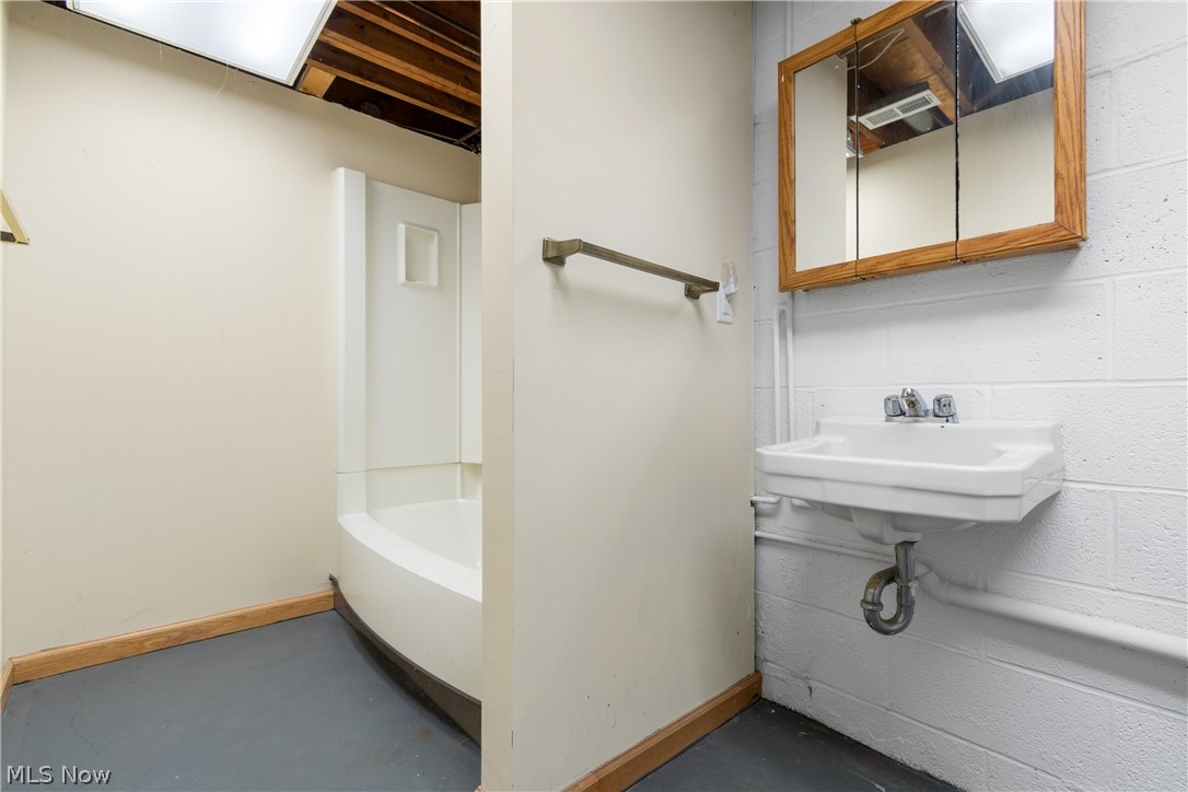 1934 Springfield Center Road Akron, OH 44312 - Photo 21 of 30 Bathroom with concrete flooring