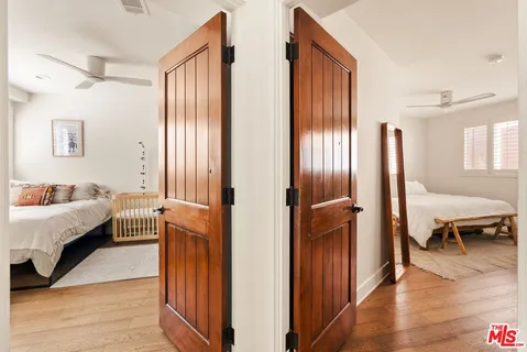 a bedroom with a bed and a couch