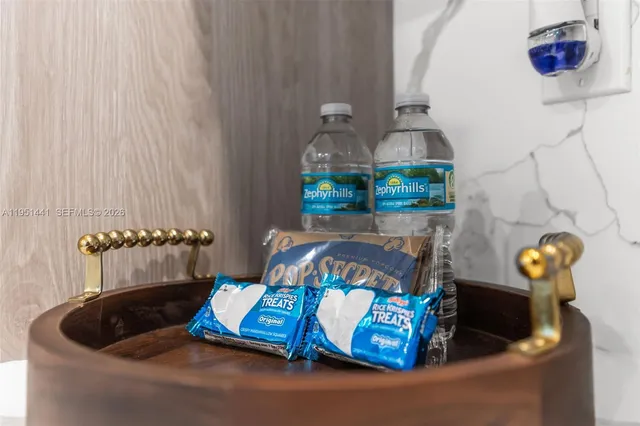 a bed room with furniture and a lamp