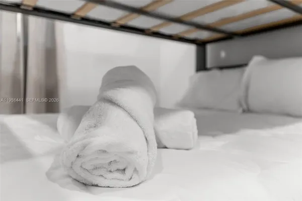 a bathroom with a toilet sink and shower