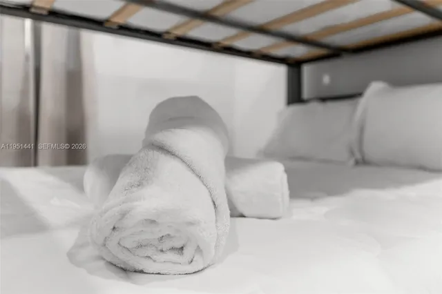 a bathroom with a toilet sink and shower