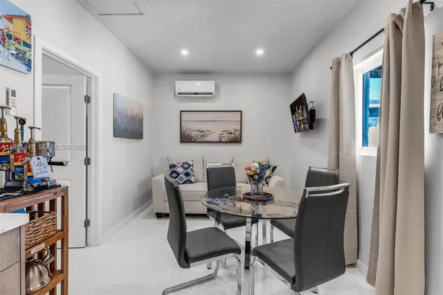 a workspace with furniture and a window