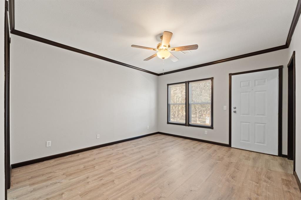 9419 Hilltop Street Rio Vista, TX 76093 - Photo 21 of 40 a view of an empty room with a window