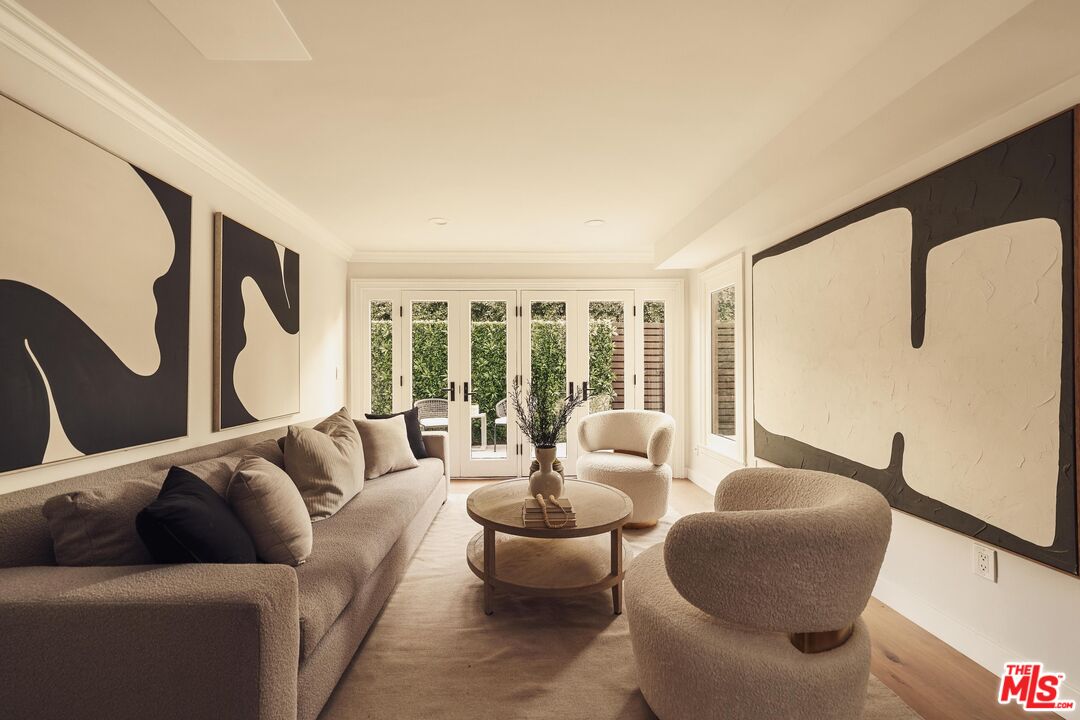 222 14th Street Santa Monica, CA 90402 - Photo 13 of 42 a living room with furniture and a large window
