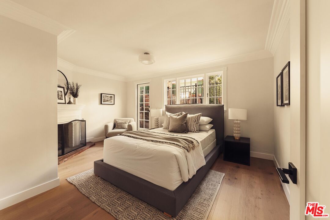 222 14th Street Santa Monica, CA 90402 - Photo 15 of 42 a bedroom with bed and a couch