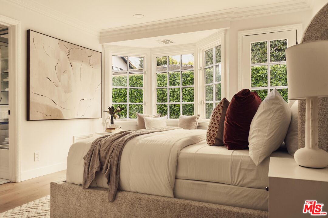 222 14th Street Santa Monica, CA 90402 - Photo 18 of 42 a bedroom with a bed and a large window