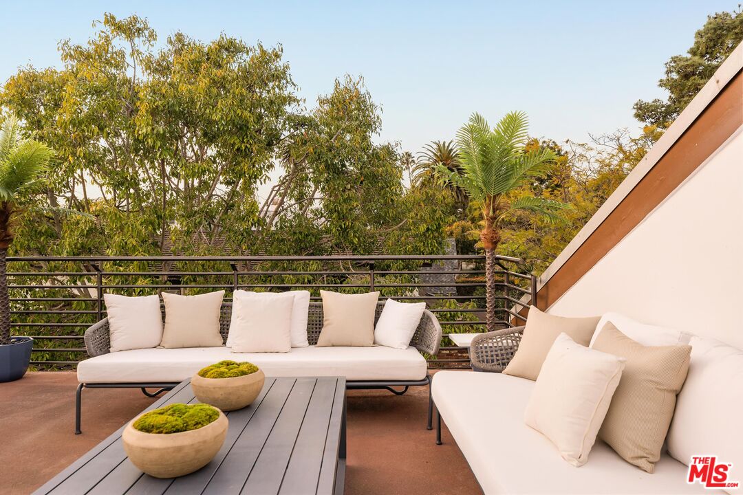 222 14th Street Santa Monica, CA 90402 - Photo 24 of 42 a roof deck with couches and potted plants