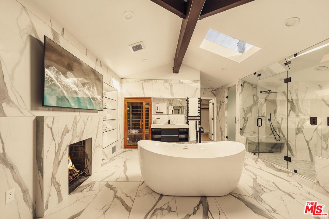 222 14th Street Santa Monica, CA 90402 - Photo 29 of 42 a living room with fireplace furniture and a flat screen tv