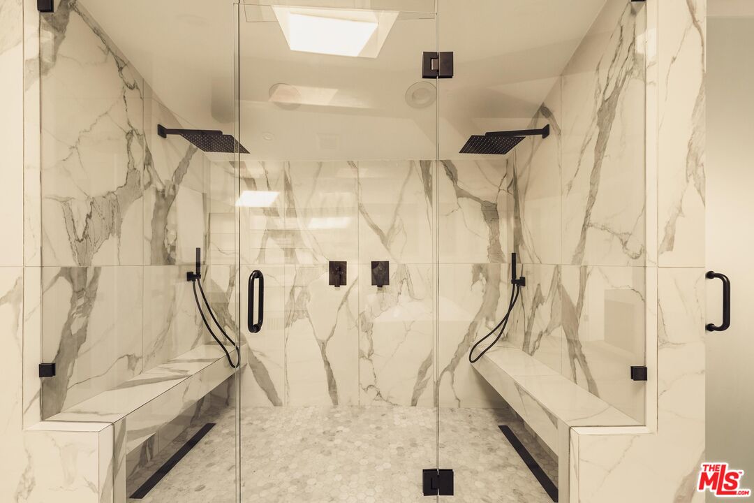 222 14th Street Santa Monica, CA 90402 - Photo 30 of 42 a bathroom with a bathtub and shower