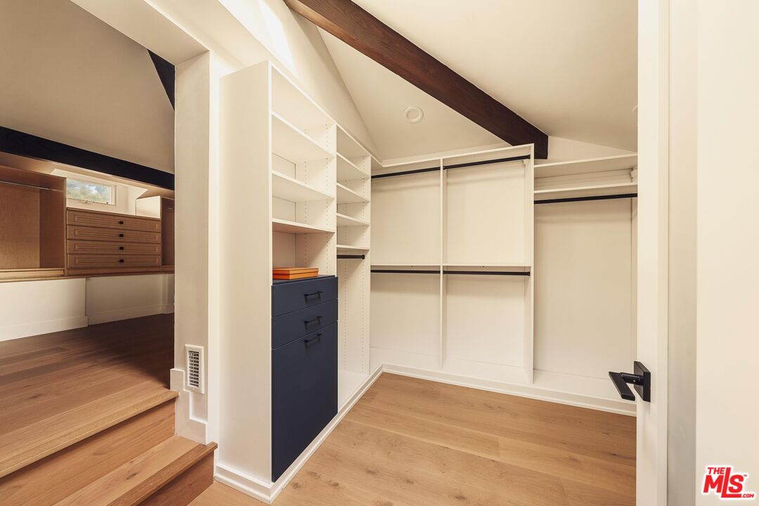 222 14th Street Santa Monica, CA 90402 - Photo 33 of 42 a view of walk in closet with empty racks