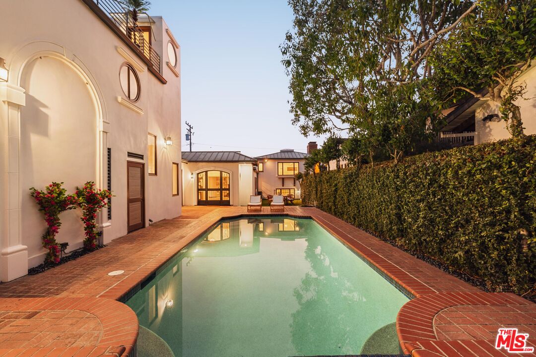 222 14th Street Santa Monica, CA 90402 - Photo 39 of 42 a view of a swimming pool with a patio