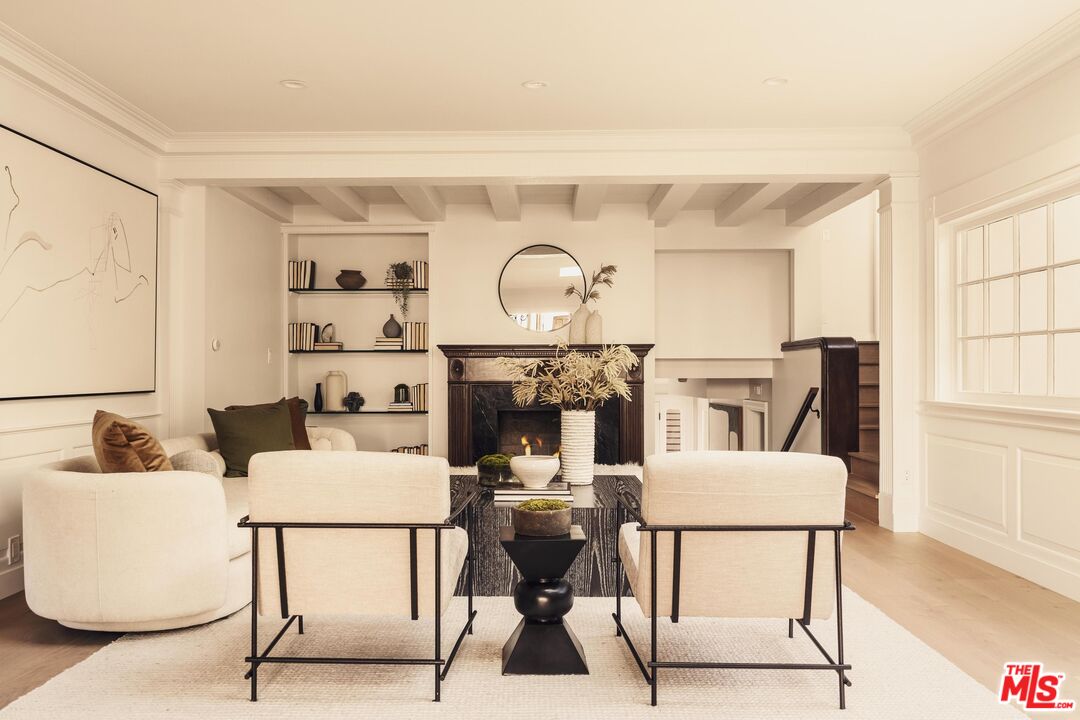 222 14th Street Santa Monica, CA 90402 - Photo 4 of 42 a living room with furniture and a fireplace