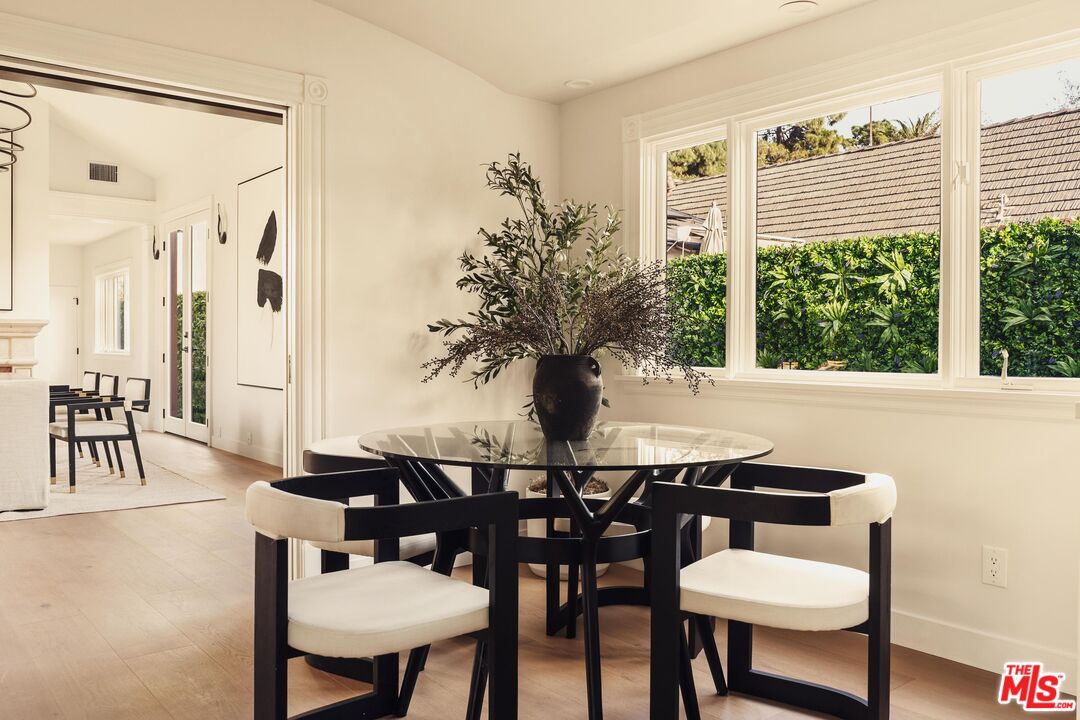 222 14th Street Santa Monica, CA 90402 - Photo 8 of 42 a view of a dining room with furniture and window