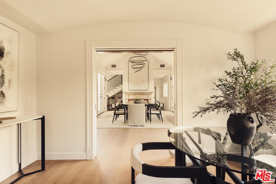 222 14th Street Santa Monica, CA 90402 - Photo 9 of 42 a view of a dining room with furniture and wooden floor