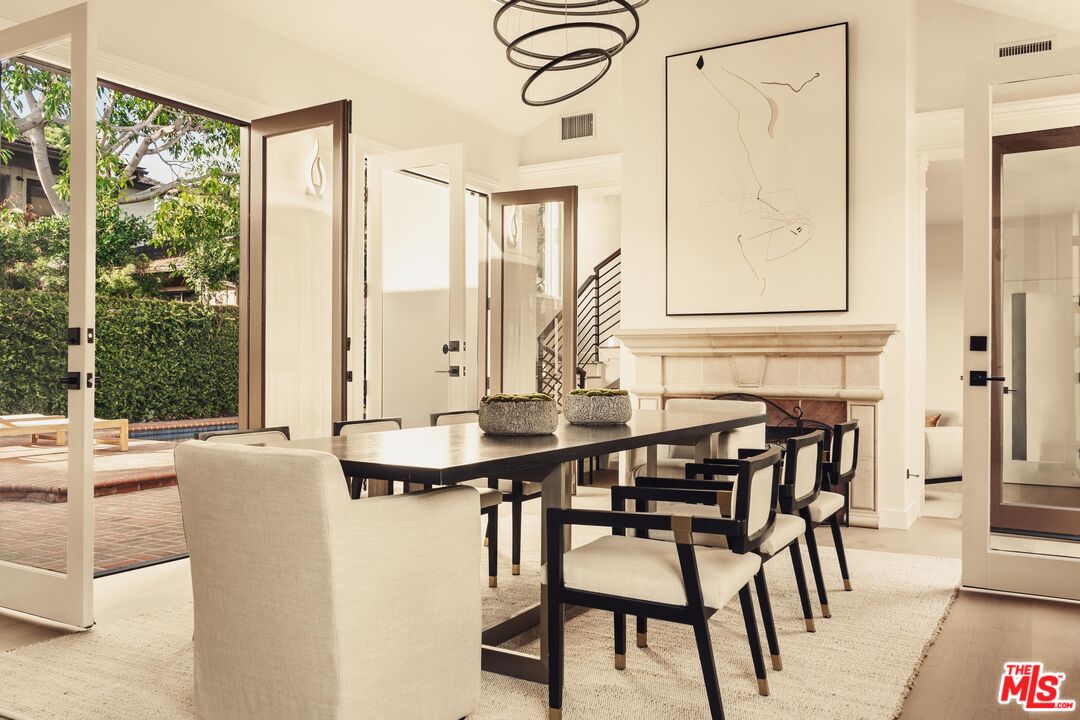 222 14th Street Santa Monica, CA 90402 - Photo 10 of 42 a view of a dining room with furniture and wooden floor