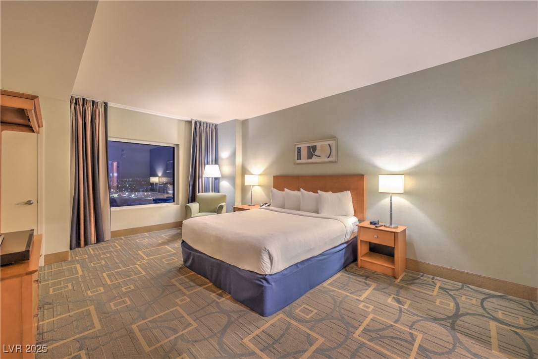 211 East Flamingo Road, Unit 1508 Las Vegas, NV 89169 - Photo 18 of 40 Carpeted bedroom featuring baseboards