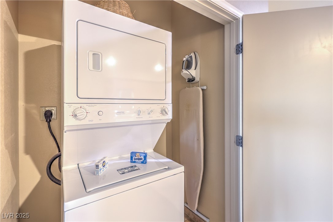 211 East Flamingo Road, Unit 1508 Las Vegas, NV 89169 - Photo 26 of 40 Laundry area with stacked washing machine and dryer