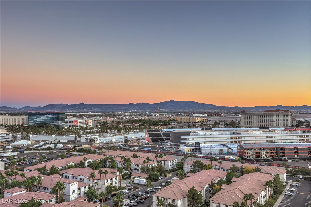 211 East Flamingo Road, Unit 1508 Las Vegas, NV 89169 - Photo 31 of 40 Aerial view at dusk of a view of city and a mountain view