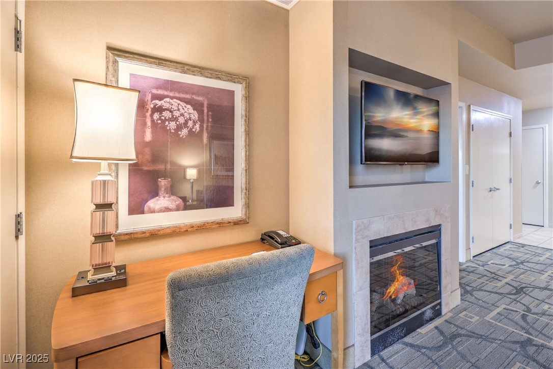 211 East Flamingo Road, Unit 1508 Las Vegas, NV 89169 - Photo 10 of 40 Home office with a fireplace