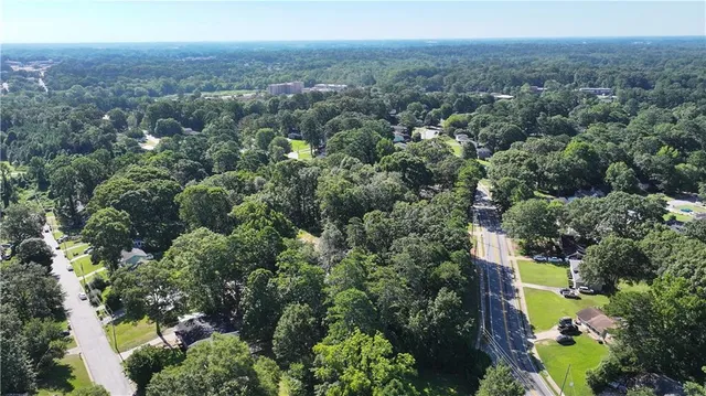 a view of a patio filled with furniture and stove