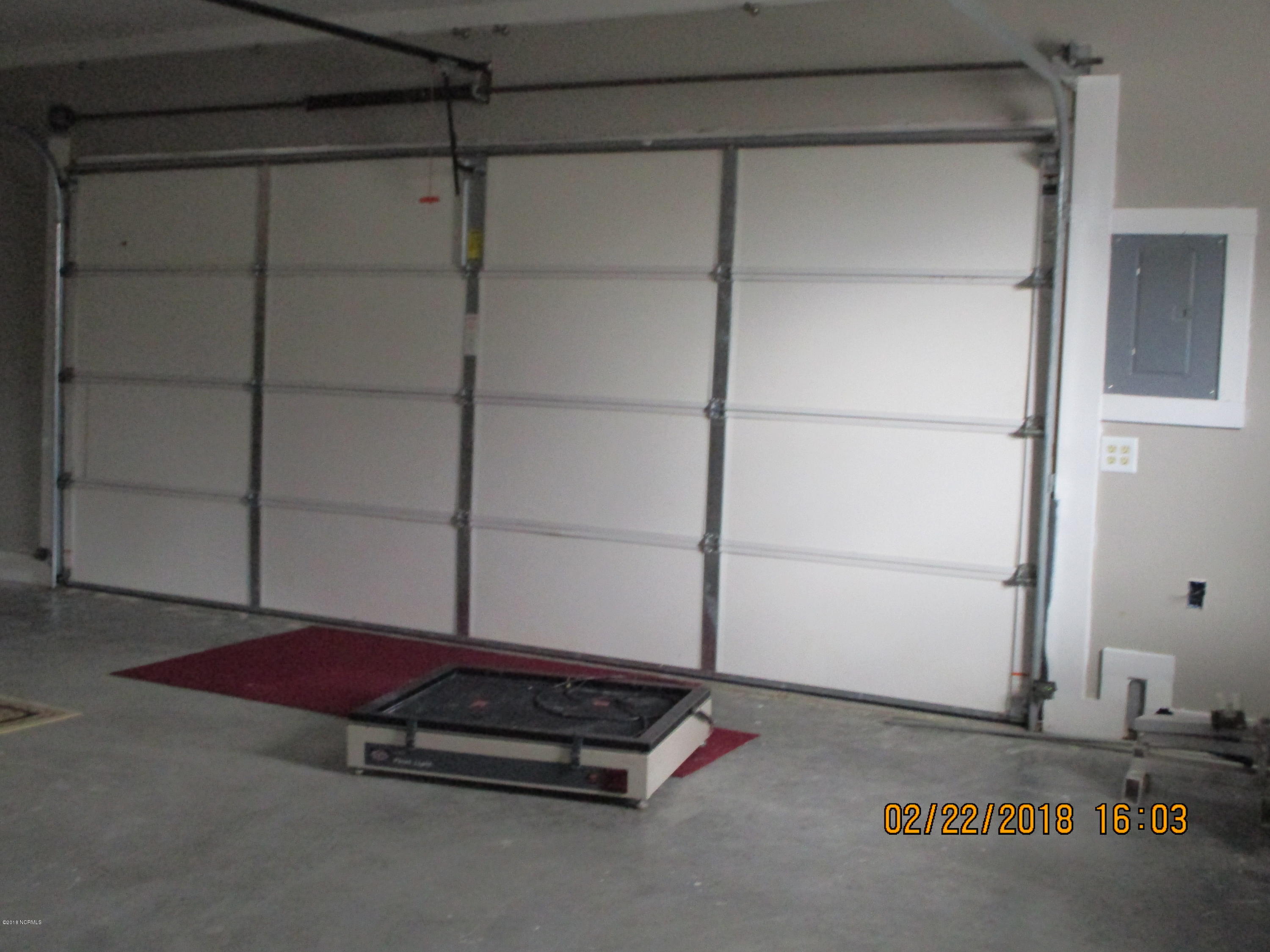 1052 Forlines Road, Unit 1 Winterville, NC 28590 - Photo 15 of 33 oversized garage door in building